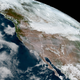 The West as seen from GOES-17, on fire and about to get snowed in.